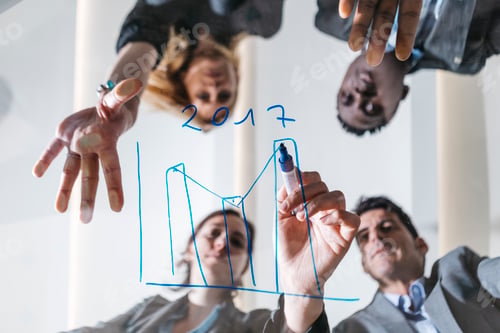 Preview: Business people drawing chart on glass screen