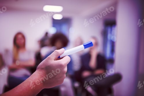 Preview: close up of teacher hand with marker