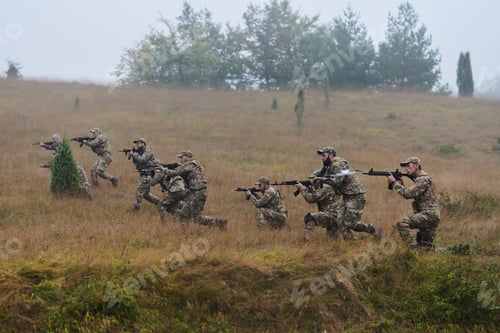Preview: A disciplined and specialized military unit, donned in camouflage, strategically patrolling and