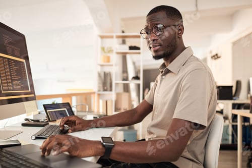 Preview: Devops Engineer Examining Programming Code
