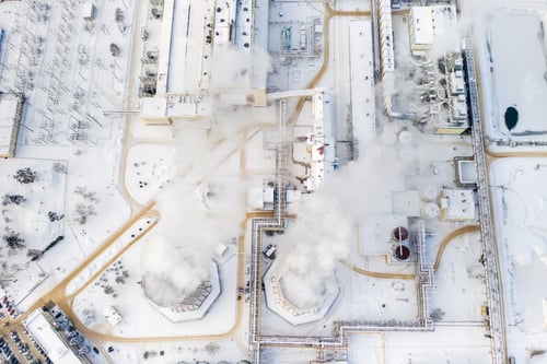Preview: Thermal power plant in winter in the city of Minsk. Smoke is coming from the big Chimneys