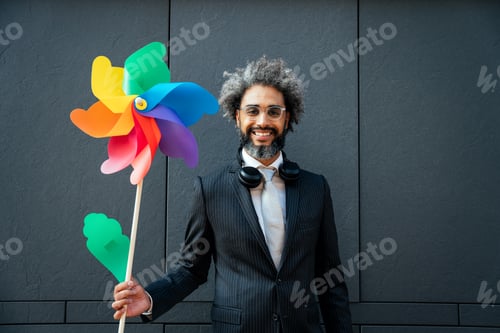 Preview: image of a young entrepreneur going to work in his successful start up business