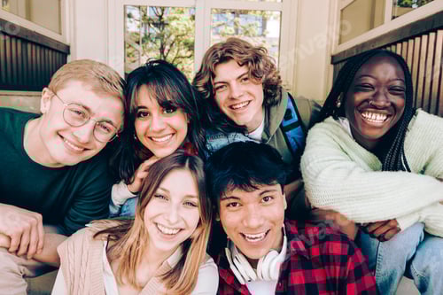 Preview: Diverse group of smiling students enjoying break time together