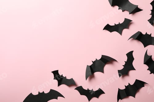 Preview: Paper bats on pink background, space for text