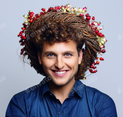 Preview: Portrait of a laughing happy man with wreath