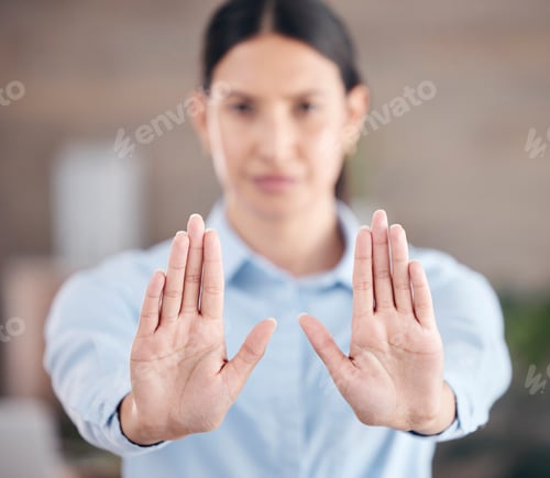 Preview: Closeup of females hands showing stop. Business woman holding out her palms. Woman saying no to
