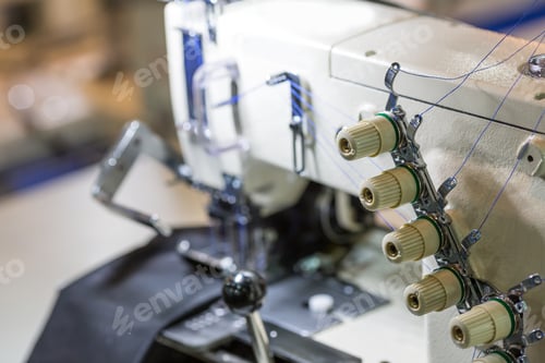 Preview: Sewing or overlock machine closeup, cloth industry