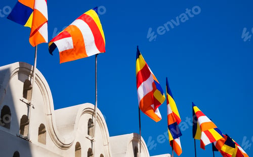 Preview: Buddhist Flag in cloudy blue sky