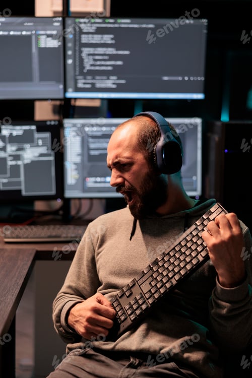 Preview: Funky developer singing at air guitar keyboard