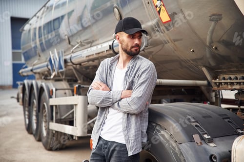 Preview: Young truck driver in casual clothes