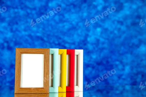 Preview: front view different picture frames with colored corners on the blue background family memory glass