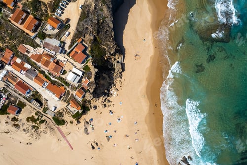 Preview: Algarve Coast in Portugal. Aerial drone view over sandy beach and Atlantic Ocean