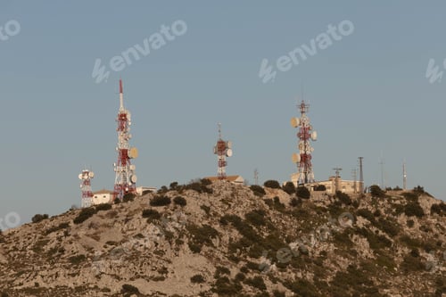 Preview: View of tv towers on the top of the hill.