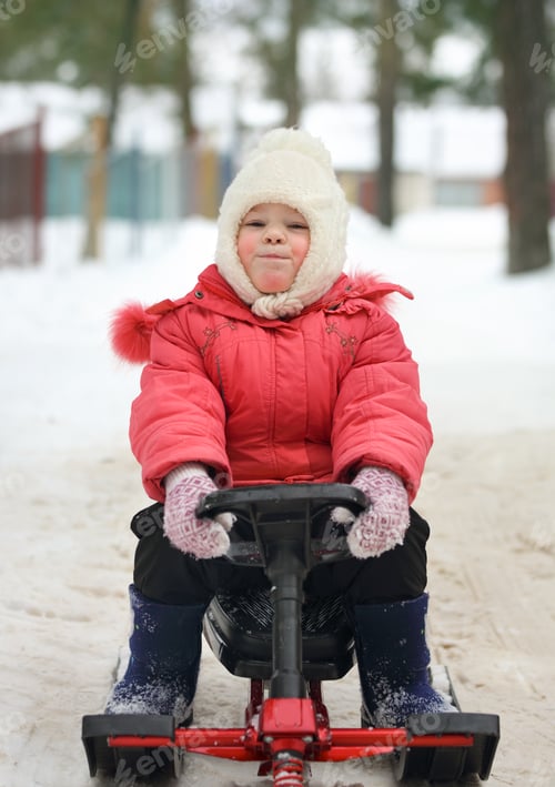 Preview: Little Girl Slides Down From The Snow Hill On A Sledge