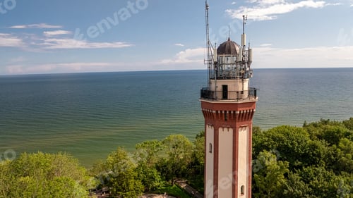 Preview: Baltic sea with a lighthouse in summer.