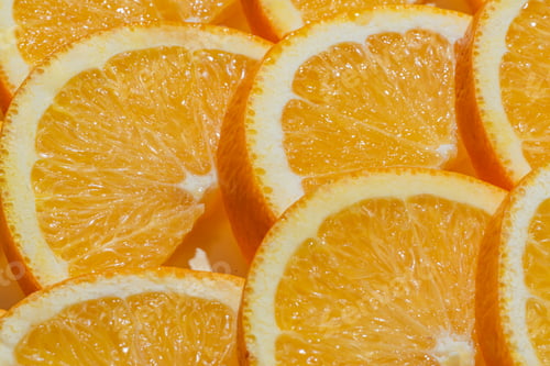 Preview: Sliced ripe oranges as a food background. Exotic fruits