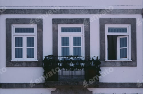 Preview: Charming Windows and Balcony of European Building