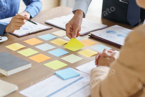 Preview: Business People brainstorming Meeting Design Ideas use post it notes to share idea