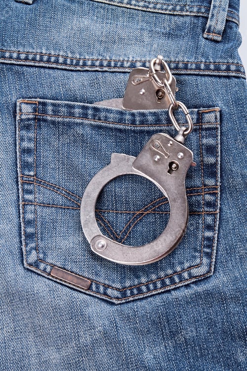 Preview: Handcuffs on a jeans back pocket.