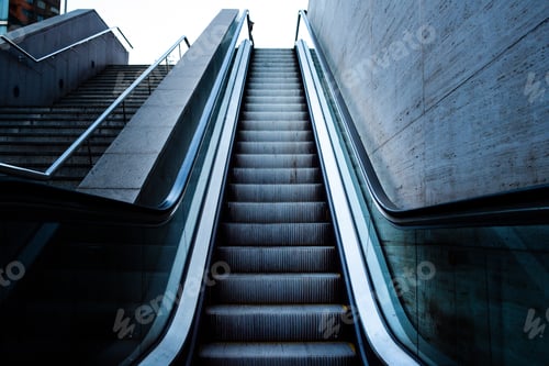 Preview: Escalator raising to the sky, concept image of arrival to success
