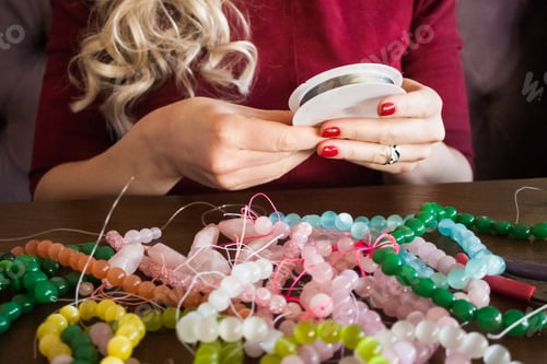 Preview: Beads of semiprecious stones. Lots of beads. Sort and select beads.