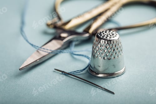 Preview: vintage silver thimble on blue