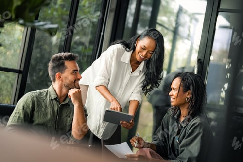 Preview: Success group of multiethnic entrepreneurs and business people achieving goals in corporate office