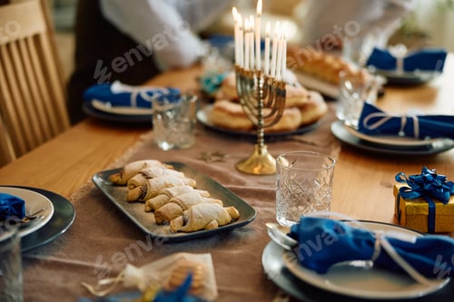 Preview: Jewish dessert pastry on dining table for Hanukkah.