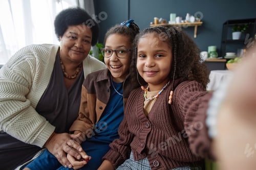 Preview: Happy Black Grandmother Taking Selfie Photo with Two Girls
