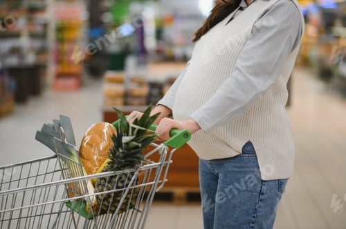 Preview: A portrait of pregnant woman customer walking along supermarket.