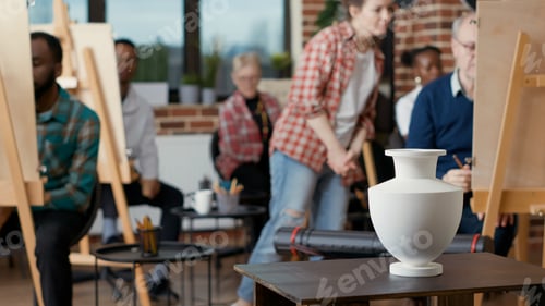 Preview: Vase on table used as inspiration model for students to draw on canvas