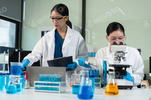 Preview: experiments containing chemical liquid in laboratory on glassware, innovative and technology.