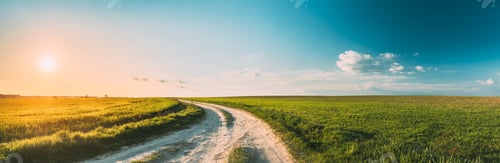 Preview: Sun Sunshine In Sunset Bright Sky. Beautiful Evening Sky Above Rural Landscape With Country Road