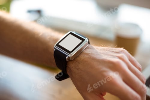 Preview: Close-up of hand wearing a smartwatch