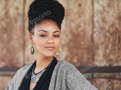 Preview: Beautiful Woman with Braided Hair and Ethnic Jewelry