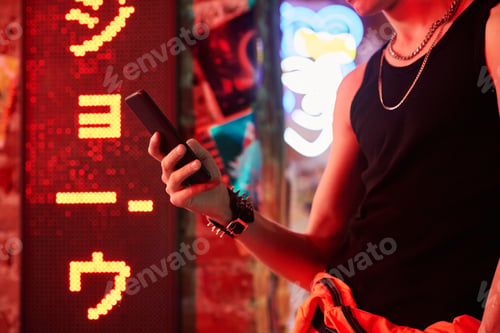 Preview: Hand of young man wearing singlet against hieroglyph meaning best ramen