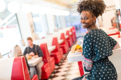Preview: Young woman in the diner