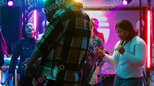 Preview: Multiethnic group of people dancing