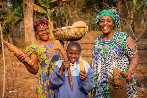 Preview: roup of African farmers have fun in the fields, they have hoes in their hands