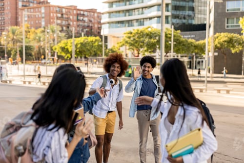 Preview: Multicultural happy friends having fun taking group selfie portrait on city street