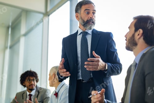 Preview: Business people working as a team at the office