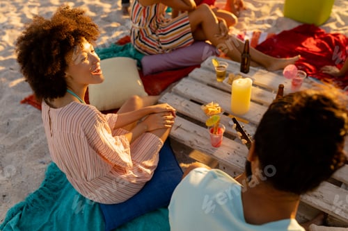 Preview: Mixed race friends group having fun on beach
