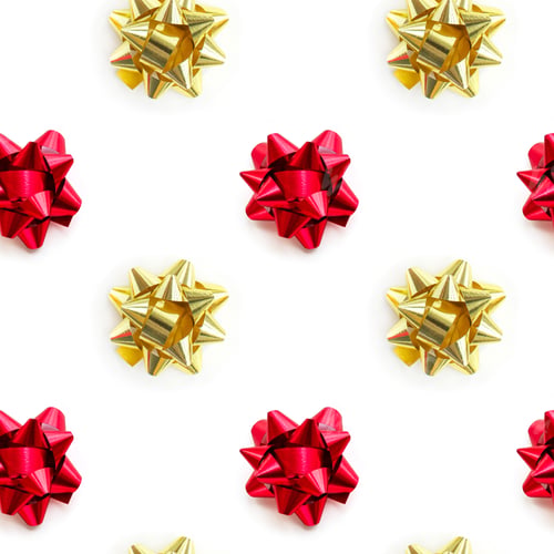 Preview: Christmas gold and red ribbon bow pattern on white background.