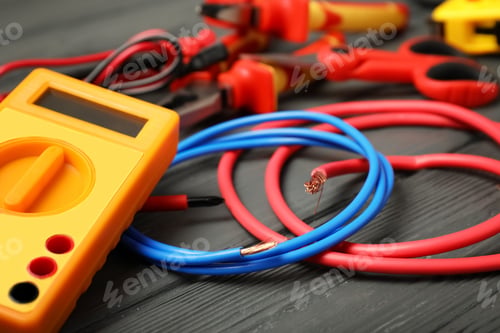 Preview: Set of electrician's tools on wooden background