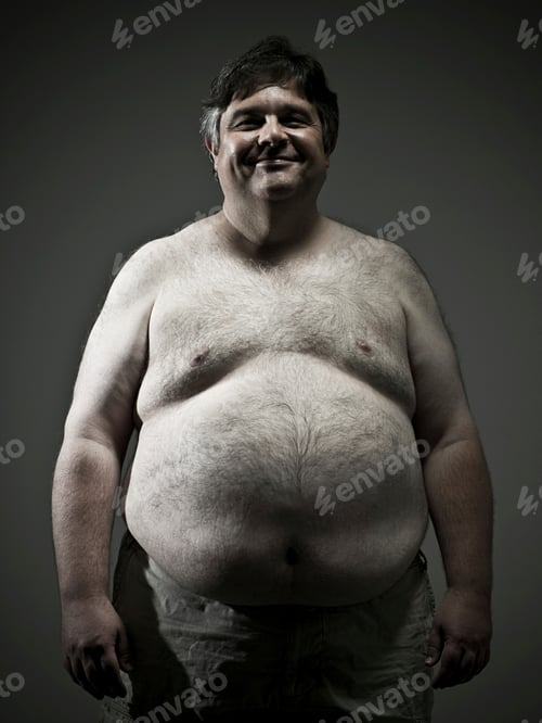 Preview: Man smiling in a studio portrait