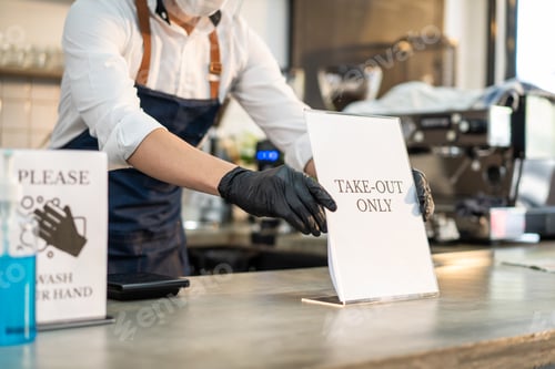 Preview: Asian cafe business owner put TAKE OUT ONLY sign on coffee bar counter.
