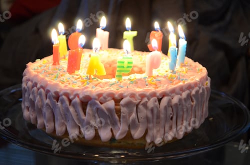 Preview: A simple birthday cake with candles lit