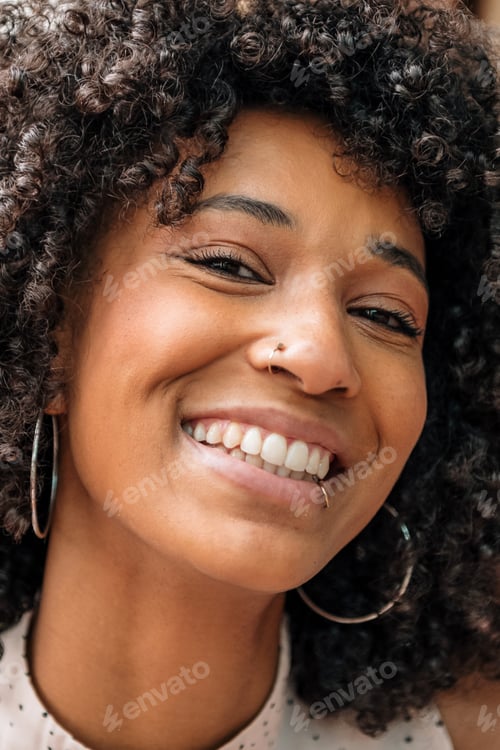 Preview: Portrait of a beautiful friendly smiling Black woman