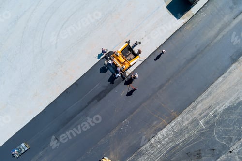 Preview: Roadwork team is ensuring that parking lot is properly prepared before applying asphalt layer