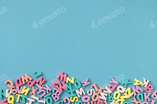 Preview: Background with many multicolored letters. Back To School. School studies, teaching to read.